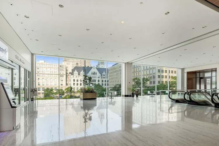 Expansive lobby with floor-to-ceiling windows in U.S Bank Center building
